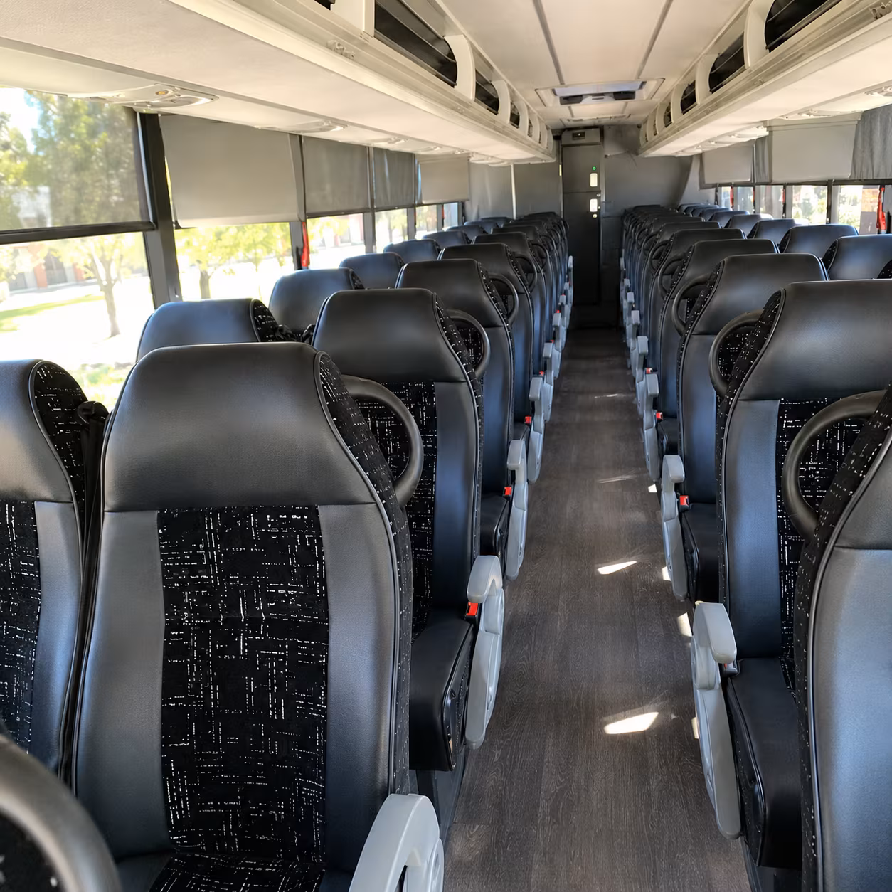 how distance and duration affect charter bus rates in johns creek